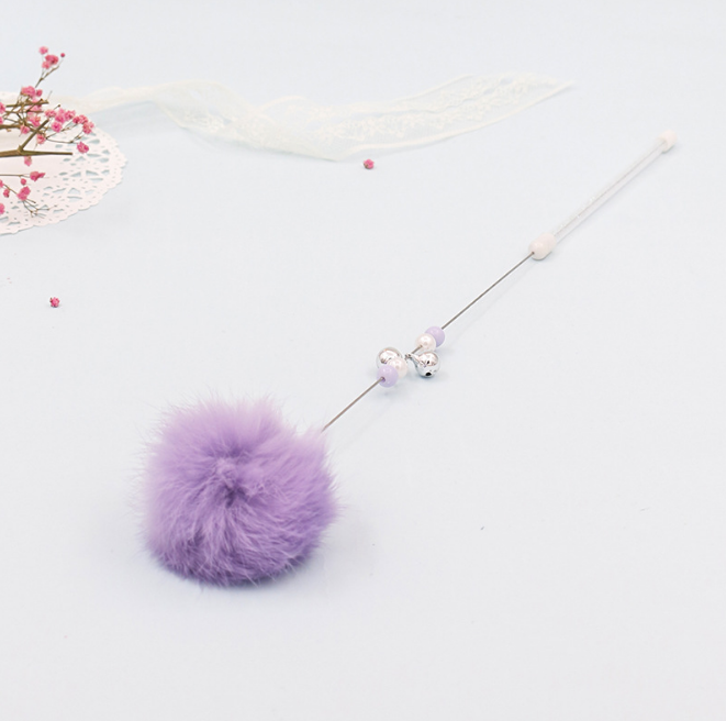 Baguette de jeu colorée pour chat avec pompons et grelot