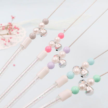 Baguette de jeu colorée pour chat avec pompons et grelot